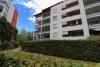 Moderne Erdgeschosswohnung mit zwei Gärten und TG-Stellplatz in Bilk - Rückansicht